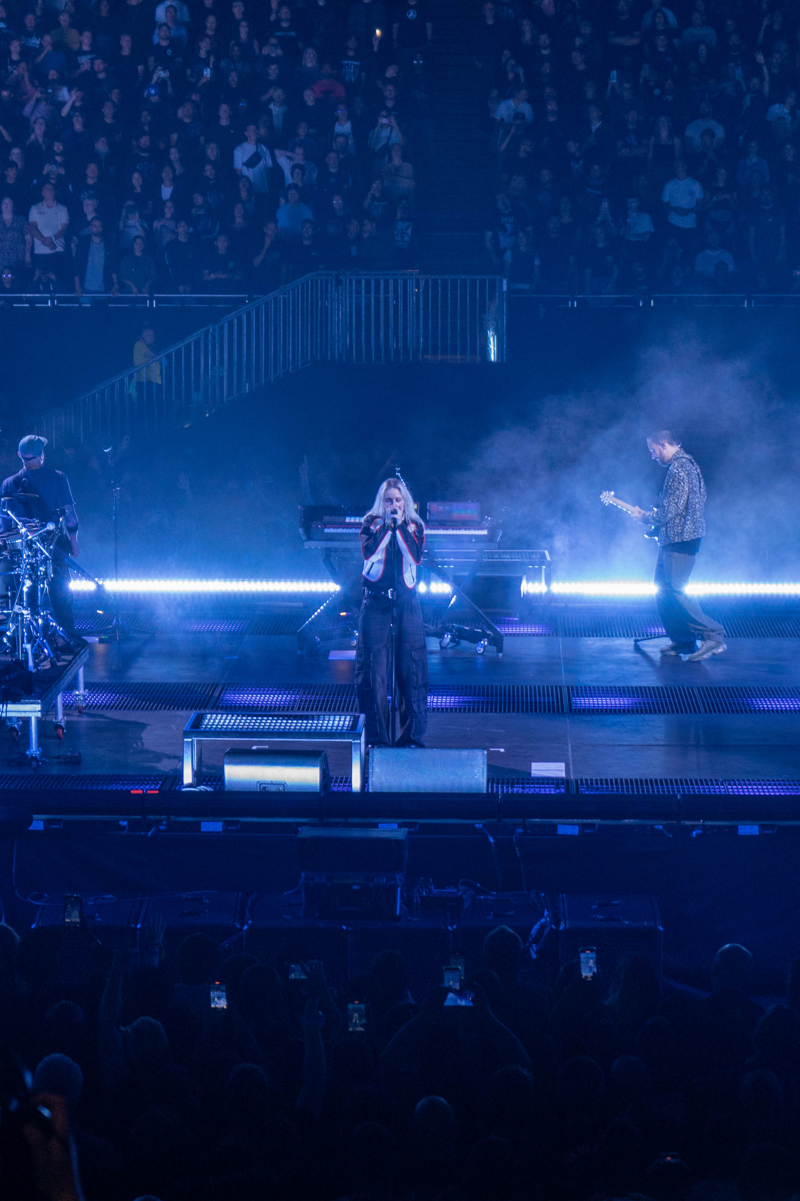 Emily Armstrong mid-performance